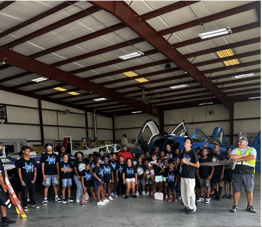 ELW youth on Phoenix Air aviation field trip