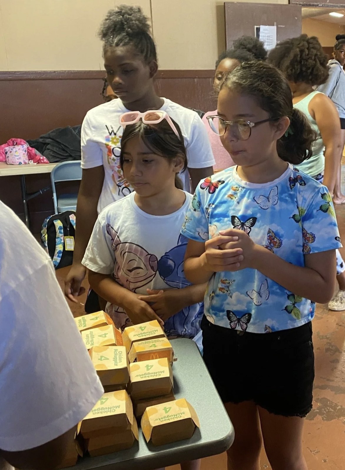 ELW youth receiving meals provided by sponsor McDonald's