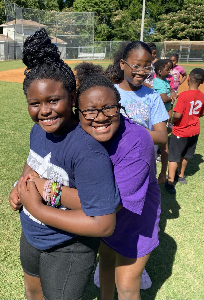 ELW campers smiling together outdoors